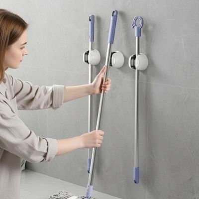 Porte balai mural à coler